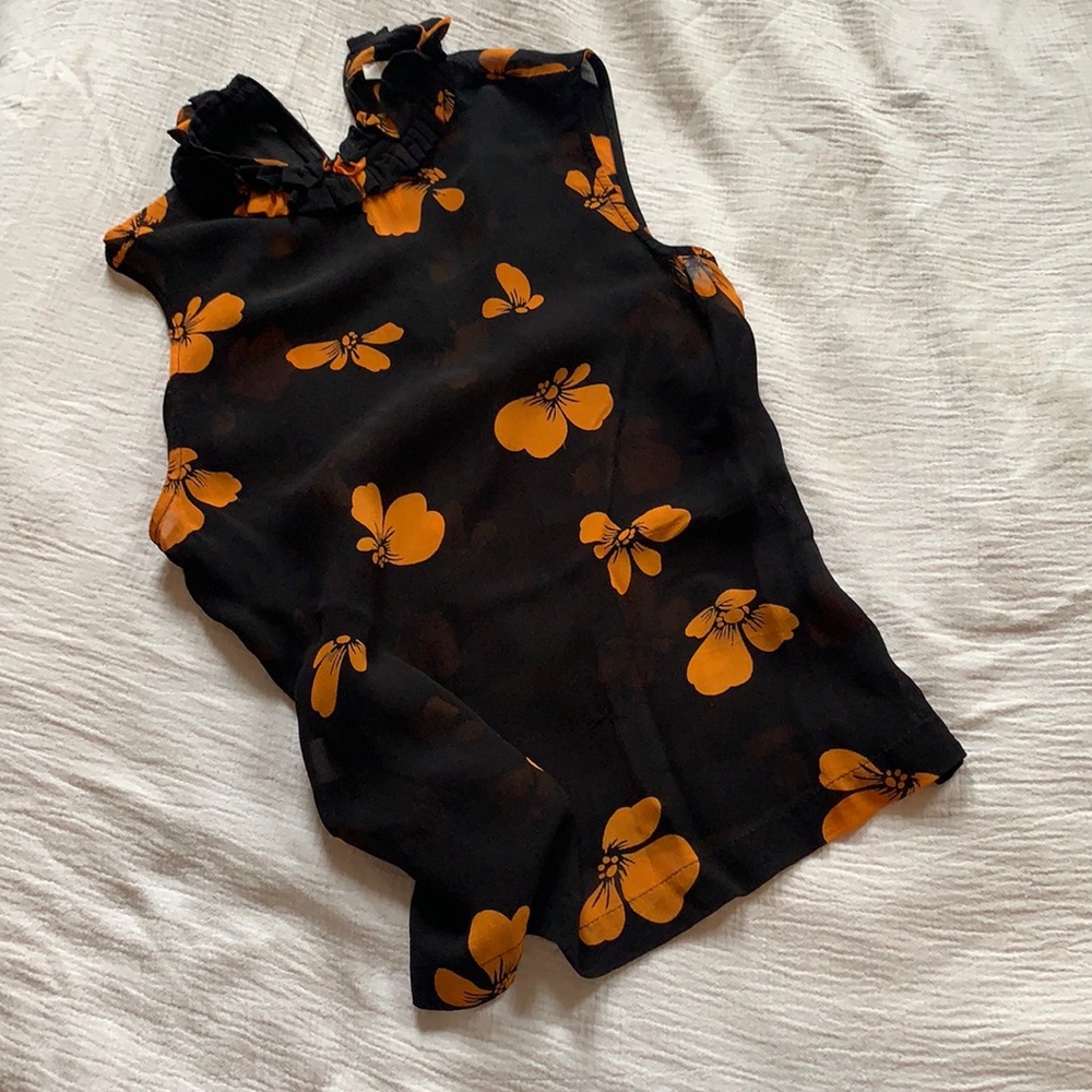 Pretty Ganni sleeveless blouse